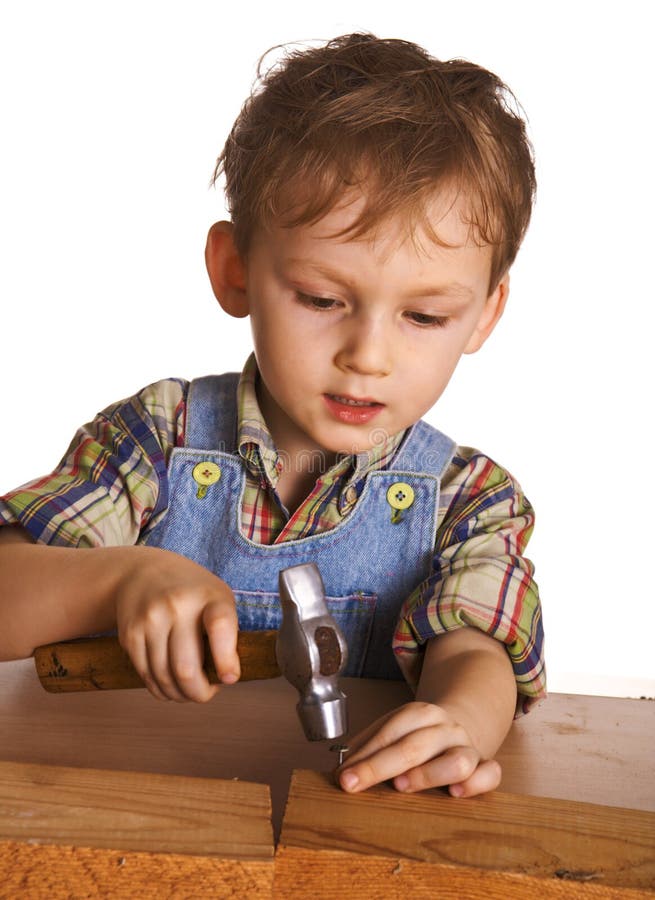 Child Hammers A Hammer In Nails Royalty Free Stock Image Image 8240706
