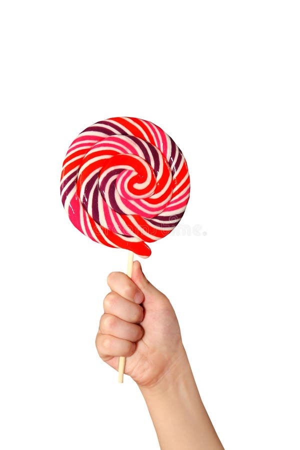 Child hand with lollipop stock photo