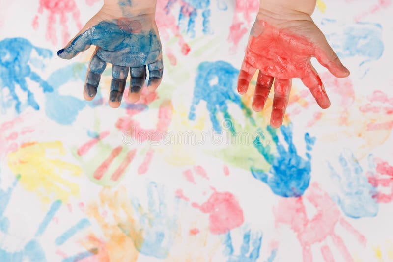 Child hands colorful painting