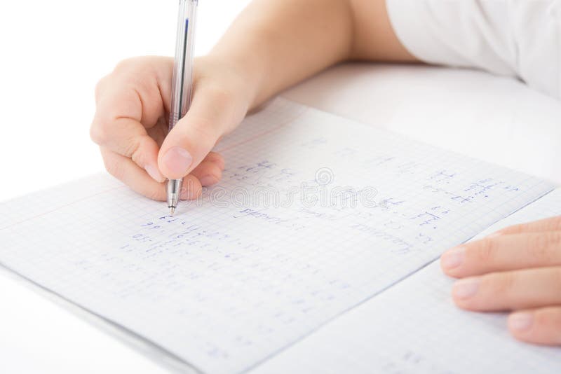 Child hands writing a homework