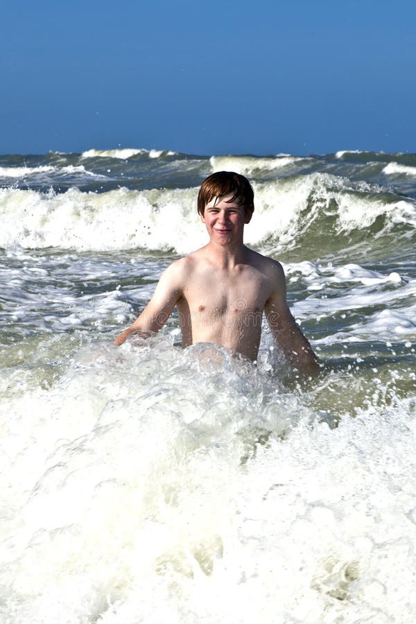 Child has fun in the waves