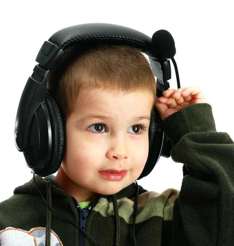 The child in headphones stock image. Image of microphone 7513575