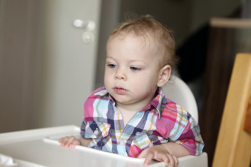 Toddler in high chair stock photo. Image of feeding, restaurant 30613714