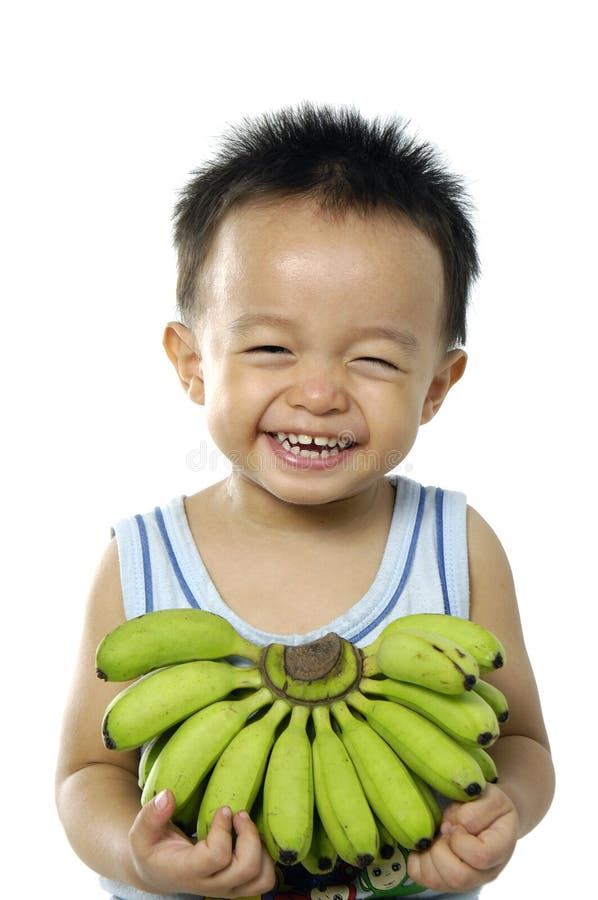 Child holding banana