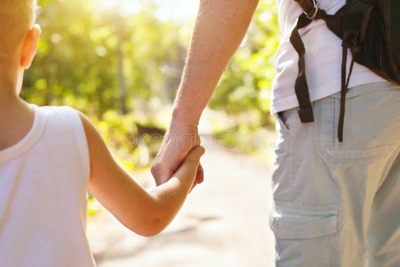 Father and child holding hands stock photography Father and child holding hands stock photography