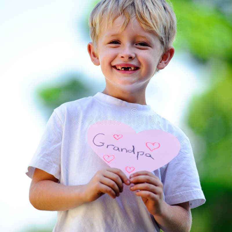 Child holding heart