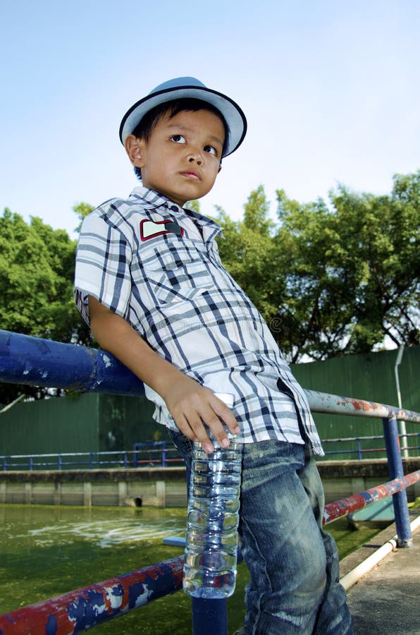 Child Holding a Water Bottle Stock Photo Image of design, gift 40032082