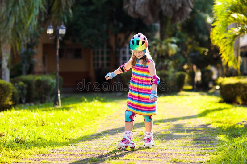 Child on inline skates. Kids skate roller blades royalty free stock image Child on inline skates. Kids skate roller blades royalty free stock image