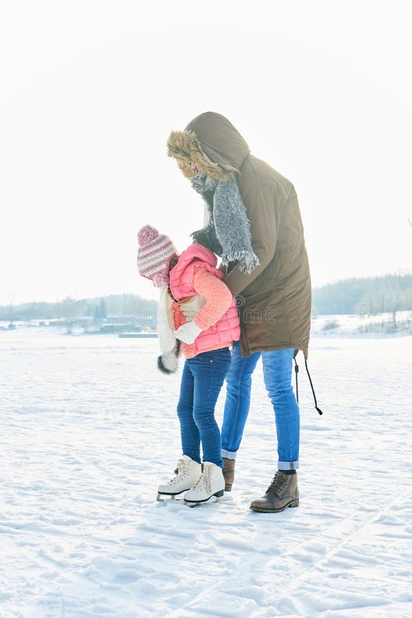 Child learns to ice-skate stock photos Child learns to ice-skate stock photos