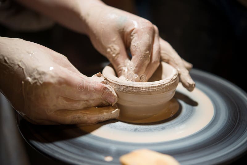 Child Learns To Make Pottery on the Potter`s Wheel Stock Image Image