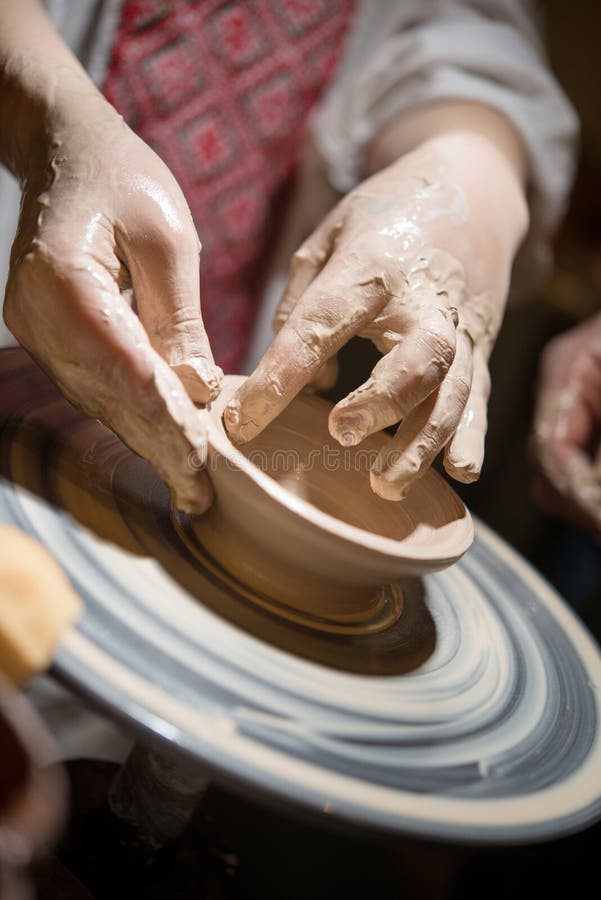 Child Learns To Make Pottery on the Potter`s Wheel Stock Image Image