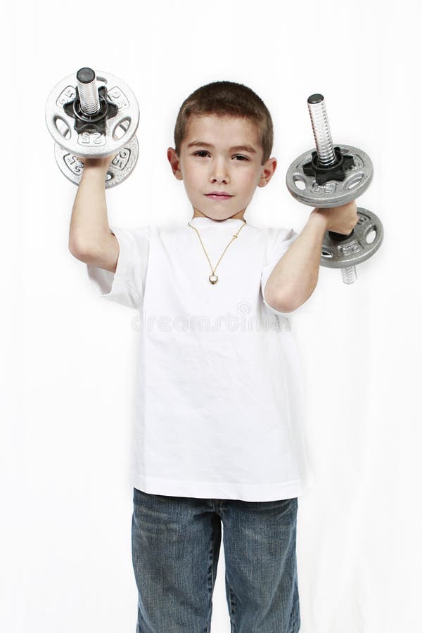 Child lifting weights stock photo. Image of exercise 12906356