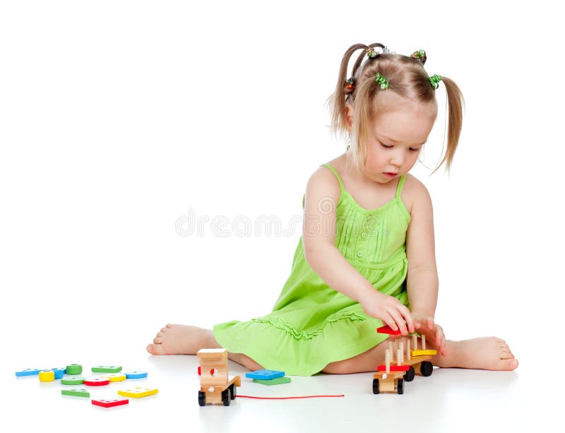 Child little girl playing with developmental toy