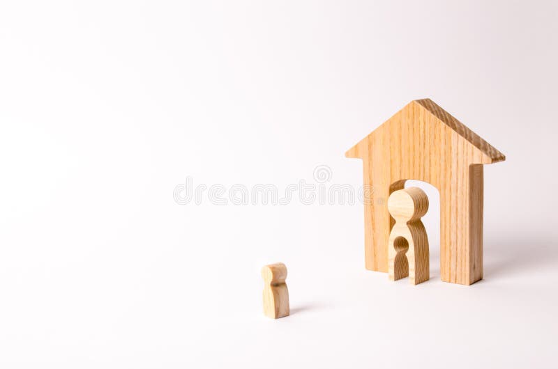 The child looks at his mother and his house before leaving. A mother with a void in the body in the form of a child is standing royalty free stock photo The child looks at his mother and his house before leaving. A mother with a void in the body in the form of a child is standing royalty free stock photo