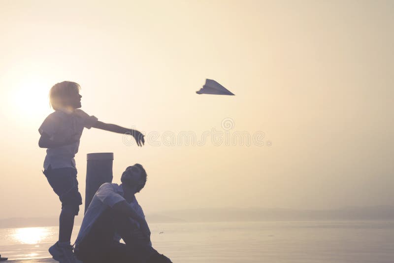 Child makes fly his paper airplane stock images Child makes fly his paper airplane stock images