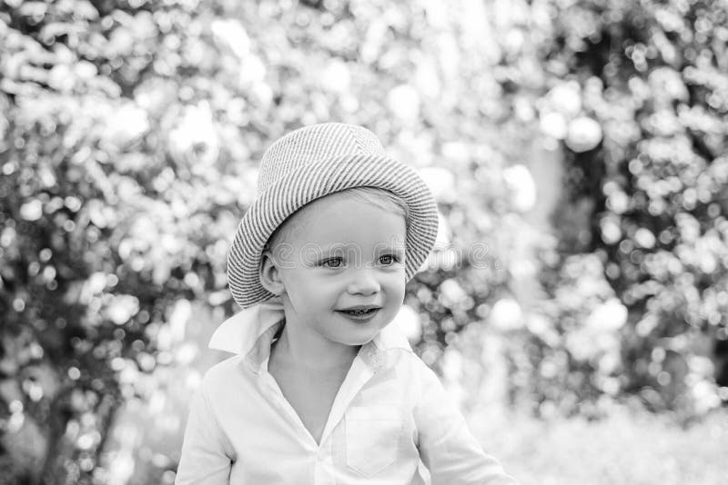 Child outdoors in nature. Beautiful fun day for cute little boy in nature. Little boy enjoy life and nature. stock photo Child outdoors in nature. Beautiful fun day for cute little boy in nature. Little boy enjoy life and nature. stock photo