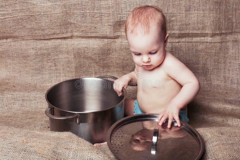 Child and pan stock photo. Image of little, human, caucasian 79174334