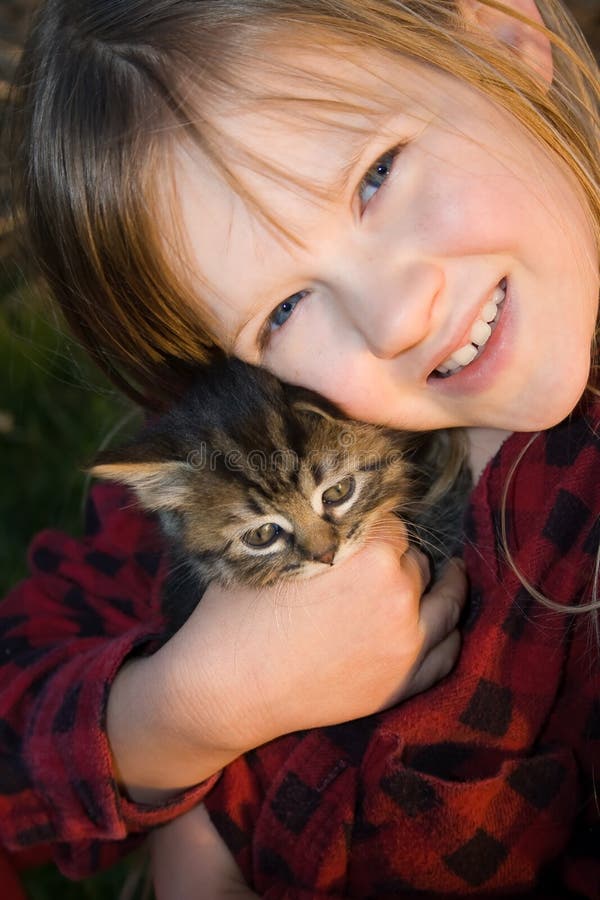 Little girl with cat pet stock image. Image of eyes, happy - 16076491