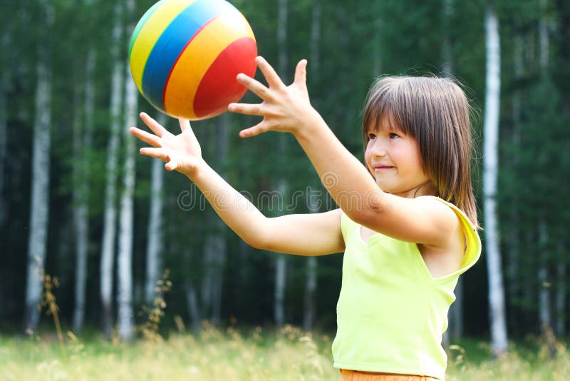 The child play with a ball