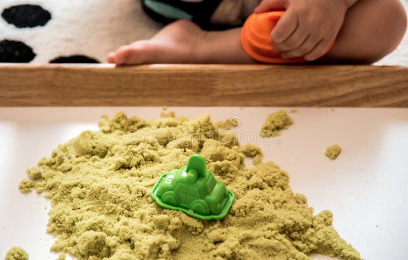 Child Play with Sand Stock Image Image of green