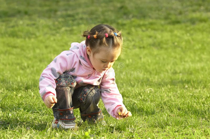 The child playing a ball