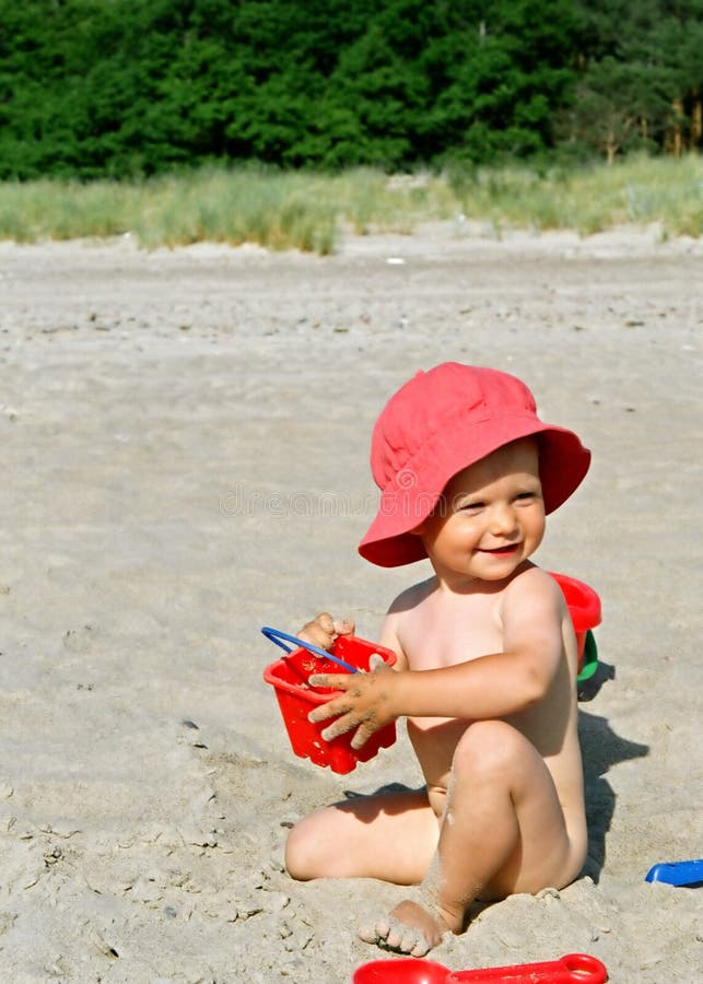 Child playing on the beach