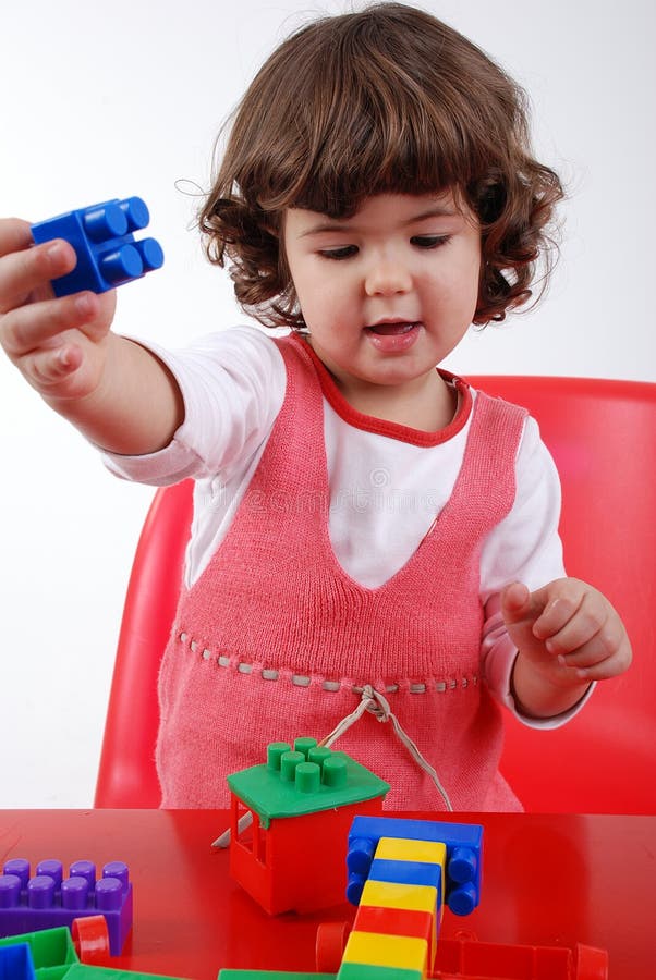 Child playing with block