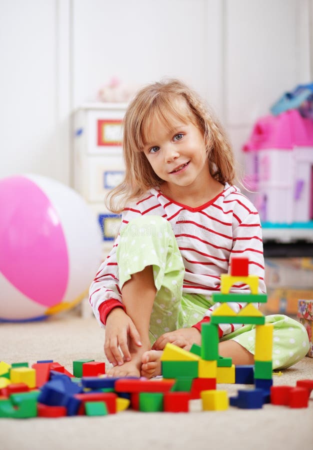 Child playing with bricks