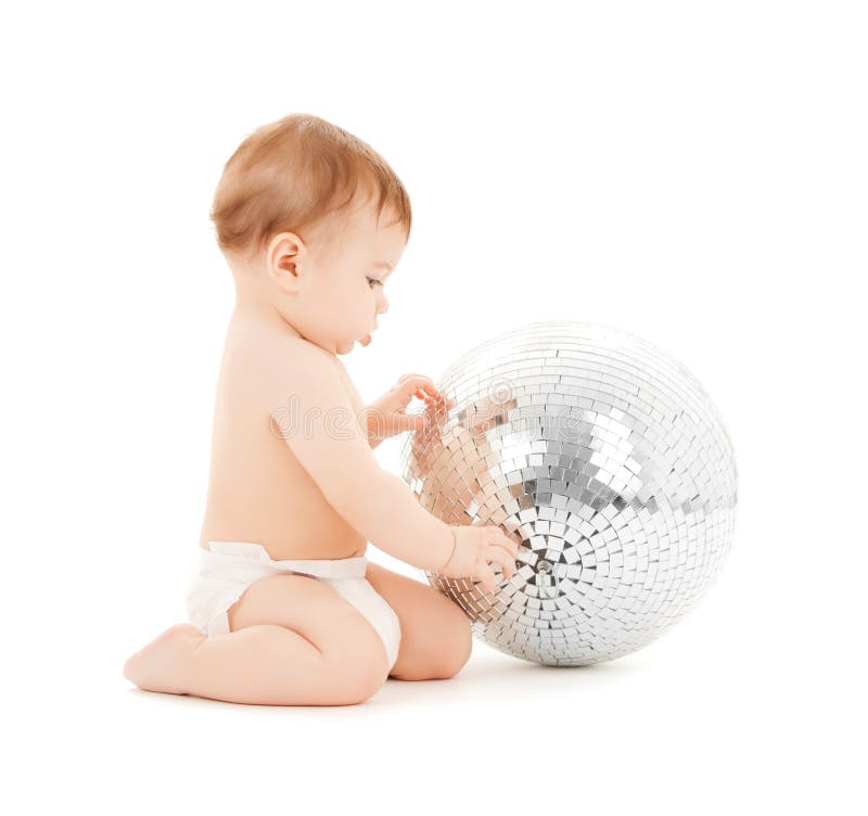 Child playing with disco ball stock photography Child playing with disco ball stock photography