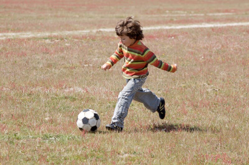 Child playing football