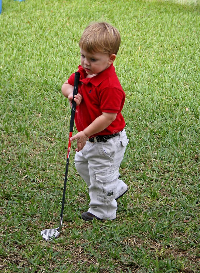 Child playing golf stock photo. Image of cute, single 8643768