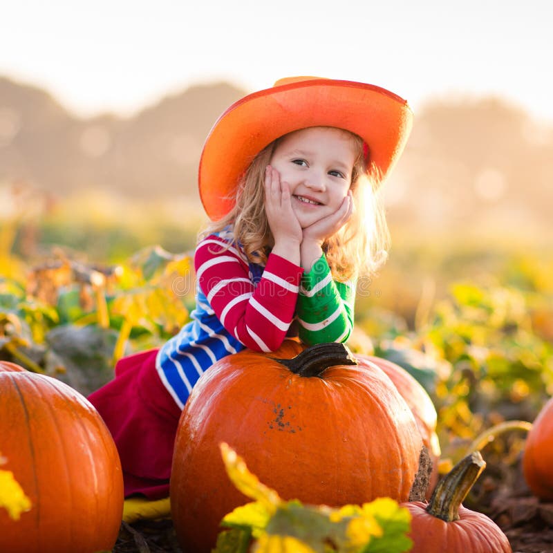 Child Playing on Pumpkin Patch Stock Image - Image of little, autumn ...