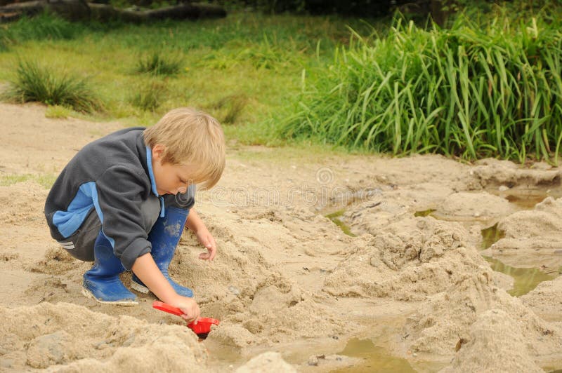 Child playing with sand