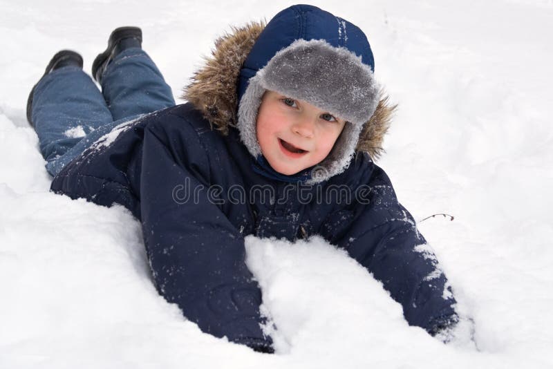 Child playing in snow