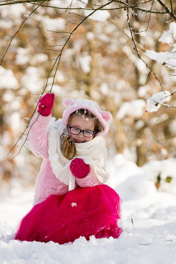 Child playing with snow in winter. Kids outdoors. Cold, ball. stock photography Child playing with snow in winter. Kids outdoors. Cold, ball. stock photography