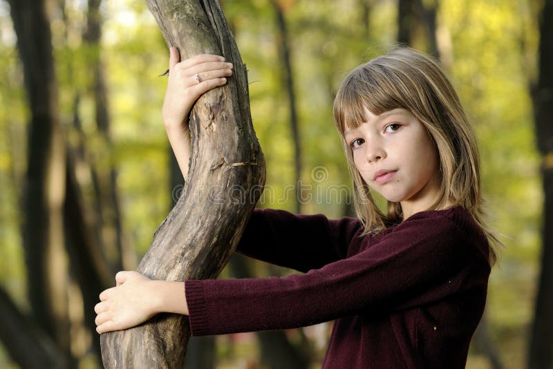 child playing with tree