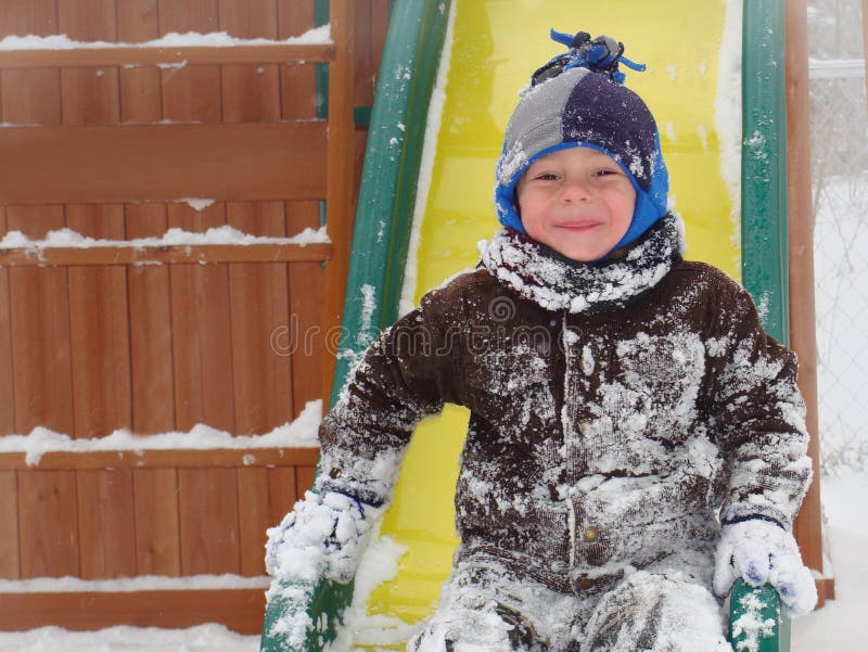 Child Playing in Winter Snow Stock Image Image of smiling, wintry