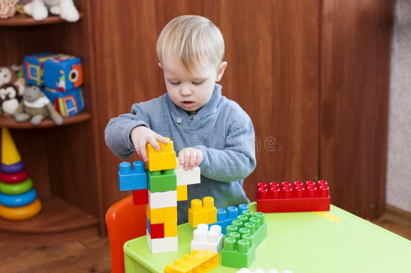 Child plays alone stock image. Image of child, play, little 85961301