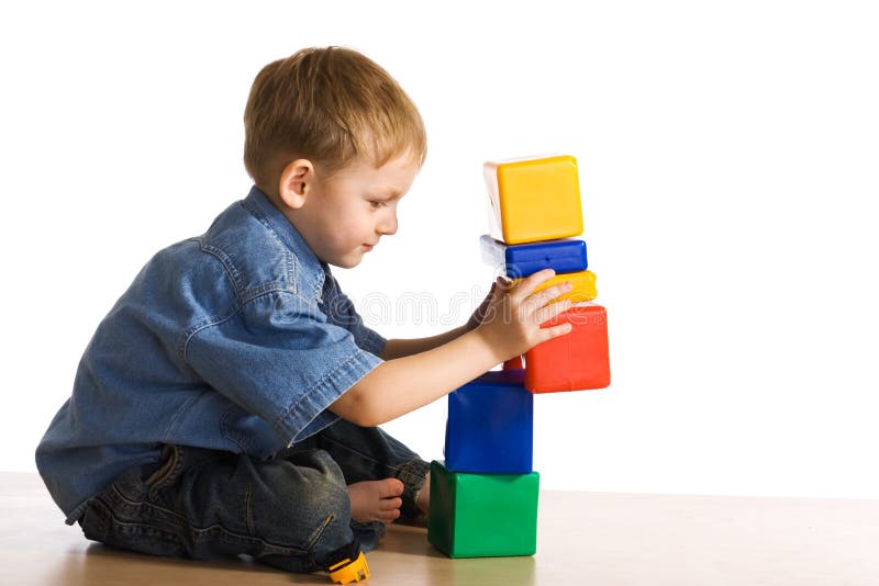 Child plays about cubes