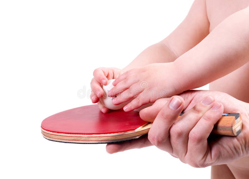 The child plays table tennis