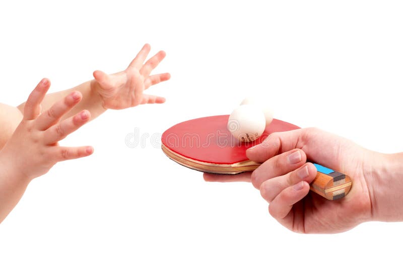 The child plays table tennis