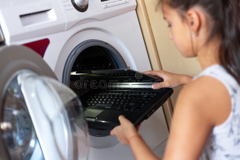 Put Laptop Washing Machine Stock Photos Free & RoyaltyFree Stock Photos from Dreamstime