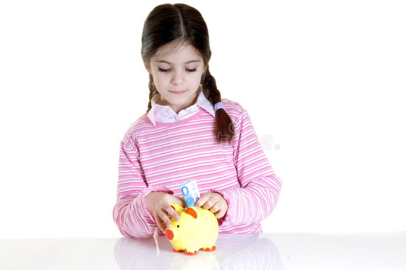 Child putting eur in money box