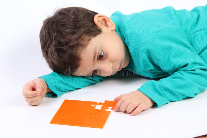 Child with puzzle