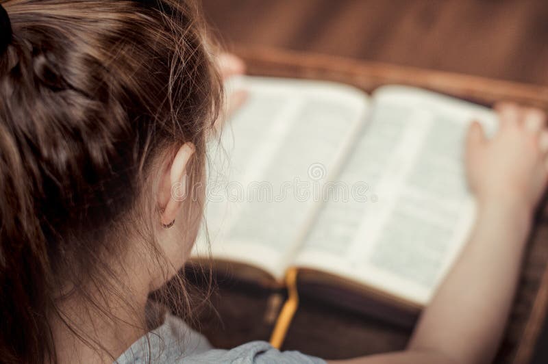 Child Reading Bible
