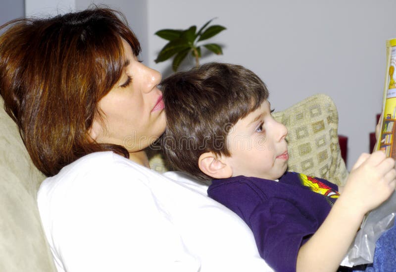 Child Reading To Mother