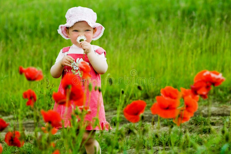 Child with red flower