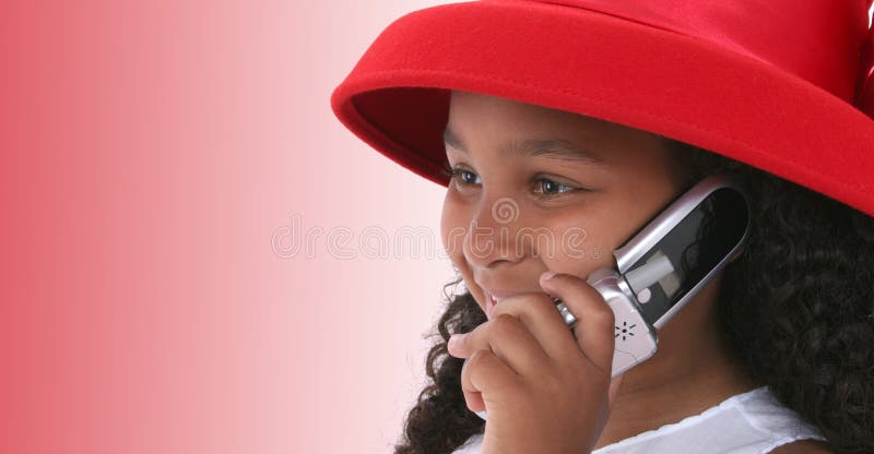 Child In Red Hat Talking On Cellphone