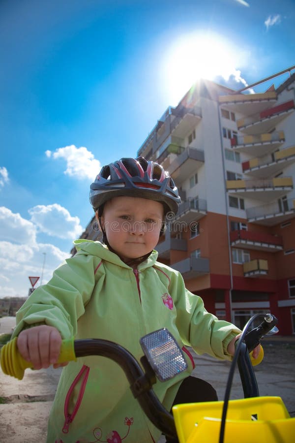 Child riding a bike stock images