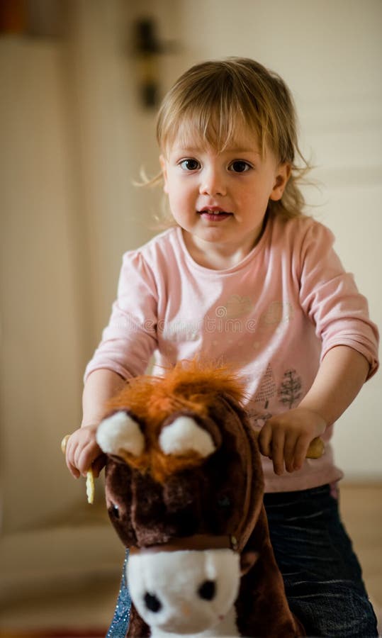 Child on rocking horse royalty free stock image Child on rocking horse royalty free stock image
